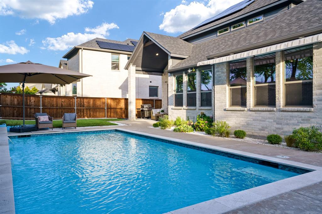 892 Panorama Drive Allen, TX 75013 - Photo 37 of 40 a view of a house with a swimming pool and sitting area