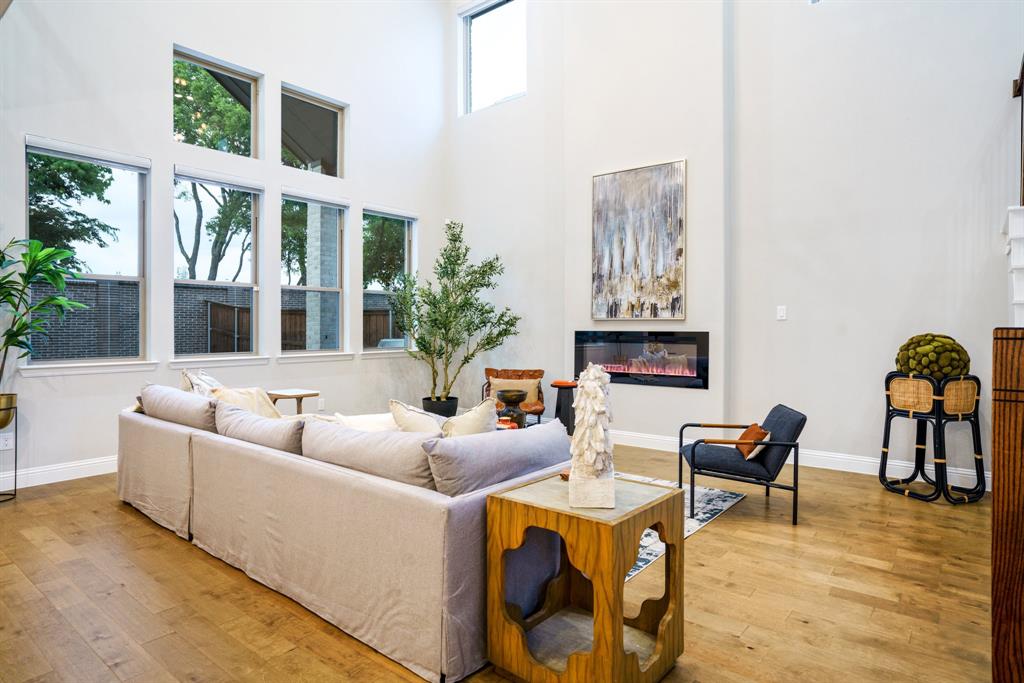 892 Panorama Drive Allen, TX 75013 - Photo 7 of 40 a living room with furniture and a large window