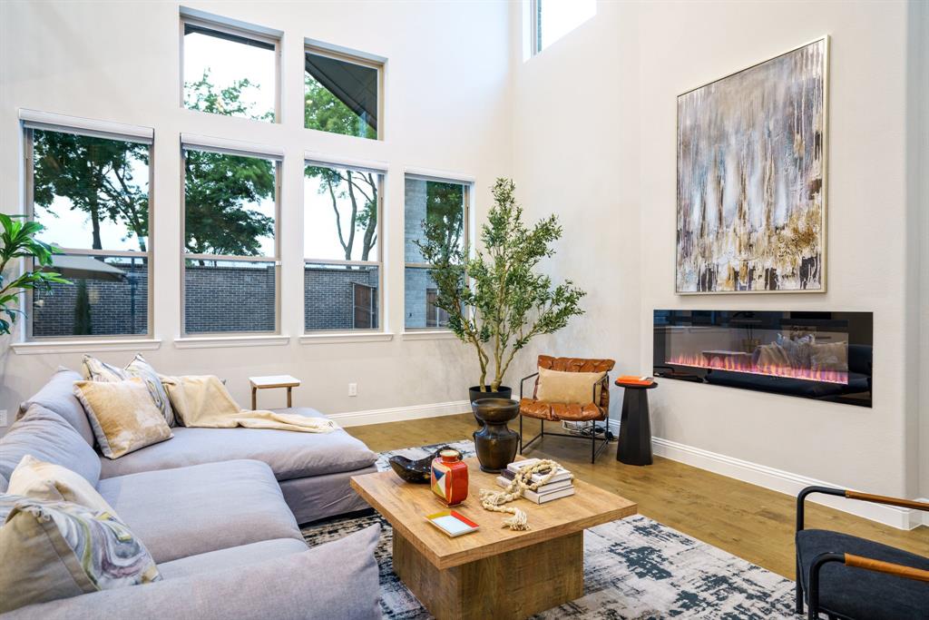 892 Panorama Drive Allen, TX 75013 - Photo 8 of 40 a living room with furniture and a large window