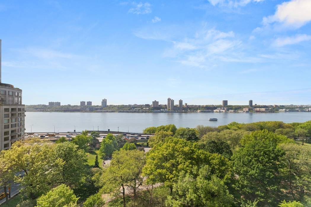 5 Riverside Drive, Unit 12B Manhattan, NY 10023 - Photo 14 of 21 a view of a lake with a big yard