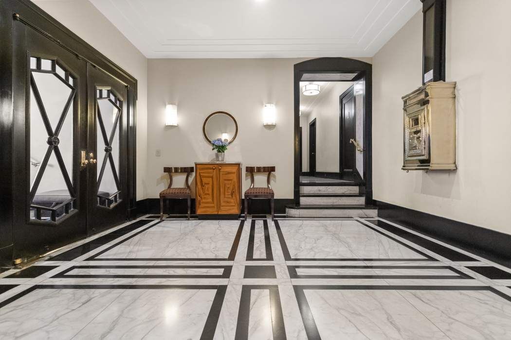 5 Riverside Drive, Unit 12B Manhattan, NY 10023 - Photo 18 of 21 a view of a room with gym equipment