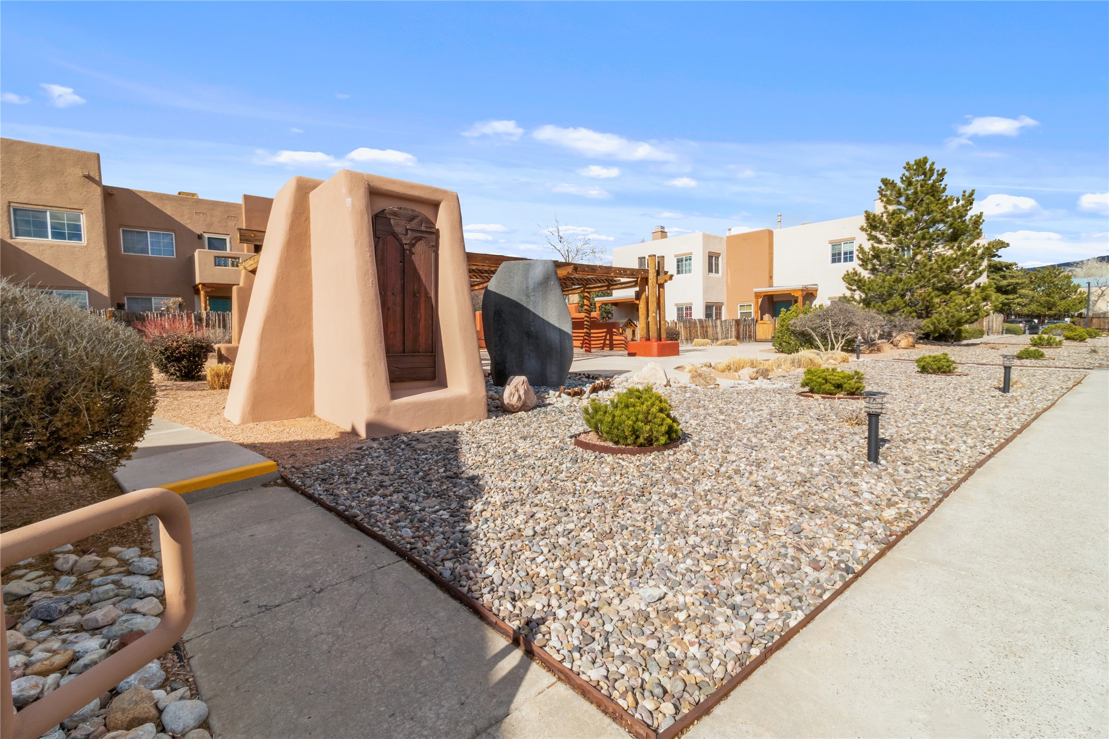 2210 Miguel Chavez Road, Unit 411 Santa Fe, NM 87505 - Photo 39 of 59 The beautiful community of Dos Santos Condominium