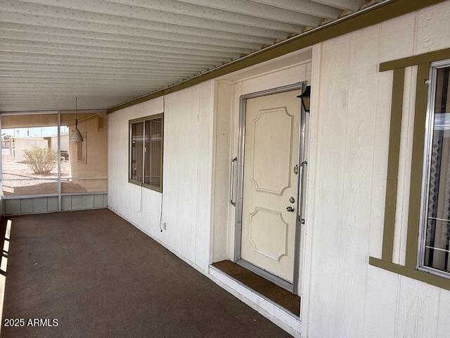 2100 North Trekell Road, Unit 97 Casa Grande, AZ 85122 - Photo 3 of 31 a view of a hallway with front door