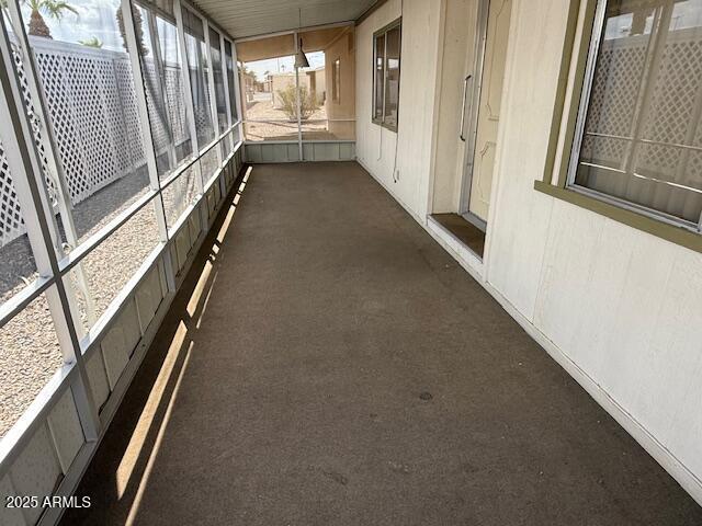 2100 North Trekell Road, Unit 97 Casa Grande, AZ 85122 - Photo 4 of 31 a view of a hallway with wooden floor and staircase