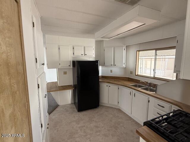 2100 North Trekell Road, Unit 97 Casa Grande, AZ 85122 - Photo 8 of 31 a kitchen with stainless steel appliances a refrigerator sink and stove