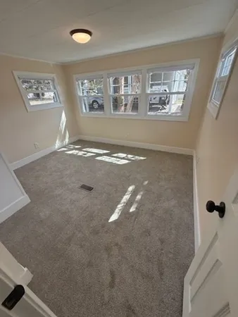 a view of livingroom with hardwood floor and window