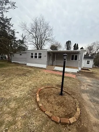 a house view with a entertaining space