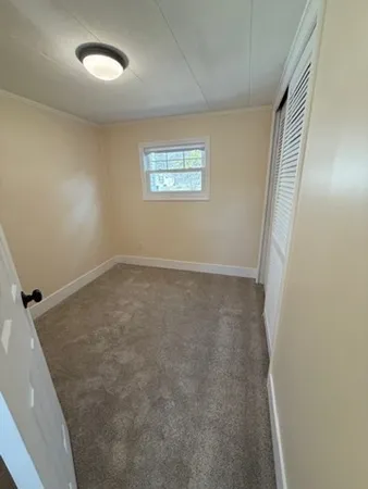 an empty room with a workbench