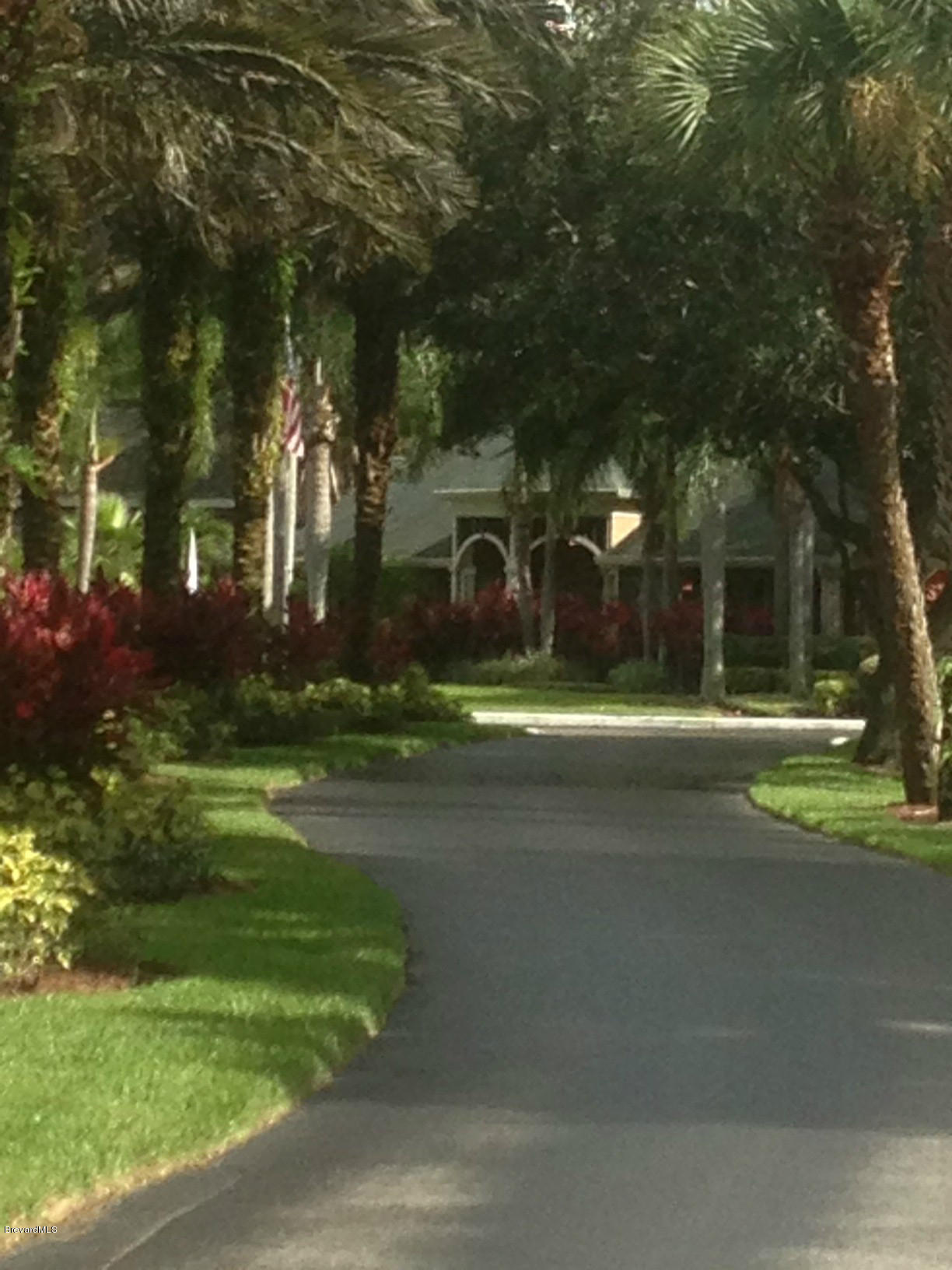 7667 North Wickham Road, Unit 623 Melbourne, FL 32940 - Photo 3 of 11 Clubhouse, sales office and Pool area