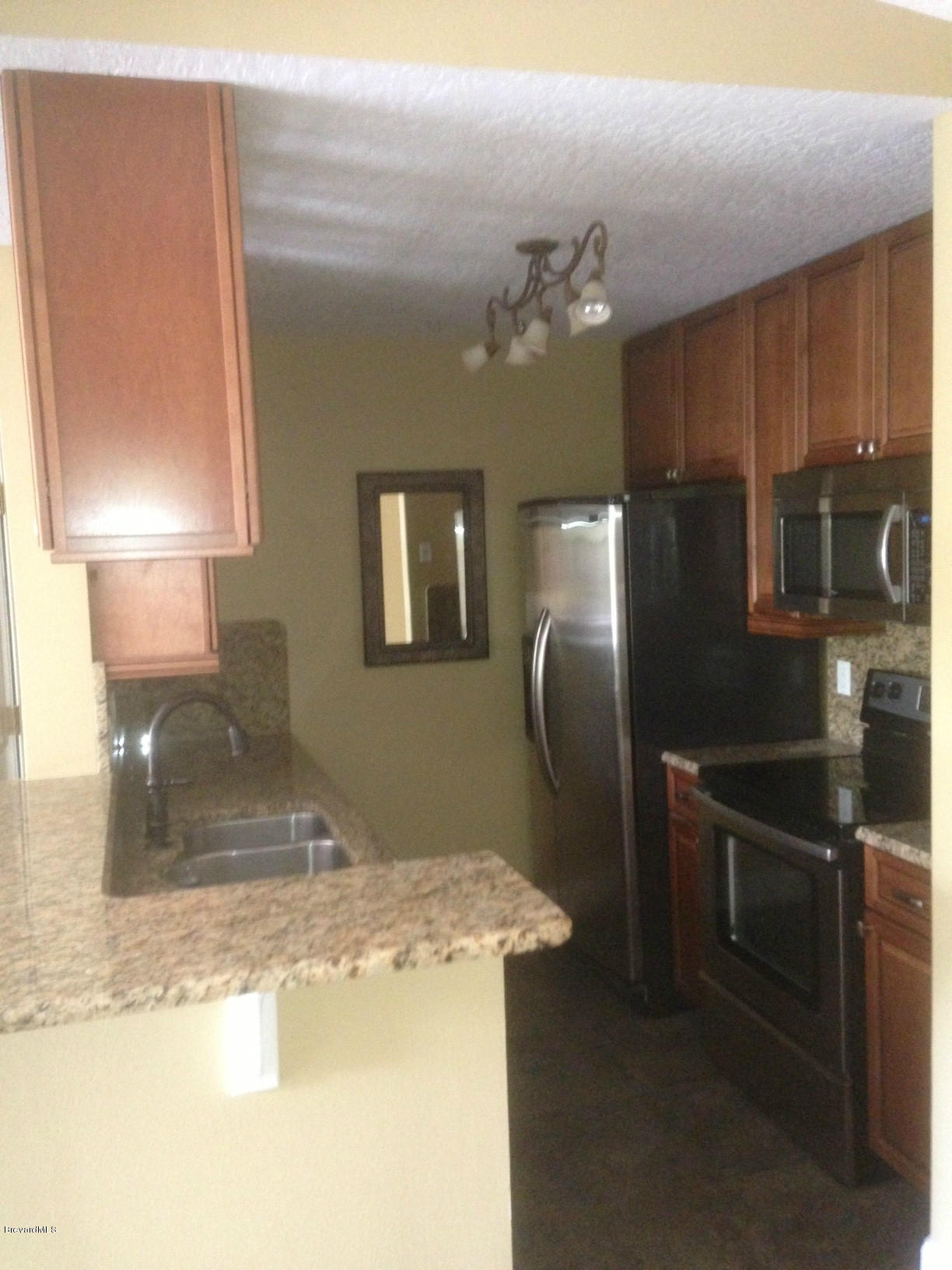 7667 North Wickham Road, Unit 623 Melbourne, FL 32940 - Photo 4 of 11 Kitchen Loaded