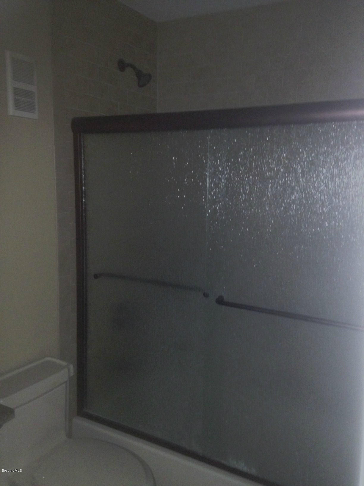 7667 North Wickham Road, Unit 623 Melbourne, FL 32940 - Photo 10 of 11 Shower with Tile top to bottom