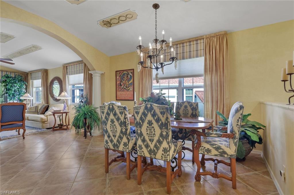 10801 Crooked River Road, Unit 203 Estero, FL 34135 - Photo 6 of 27 a view of a dining room with furniture window and outside view