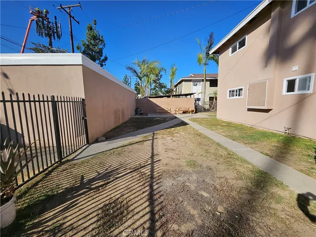 a view of a house with a street