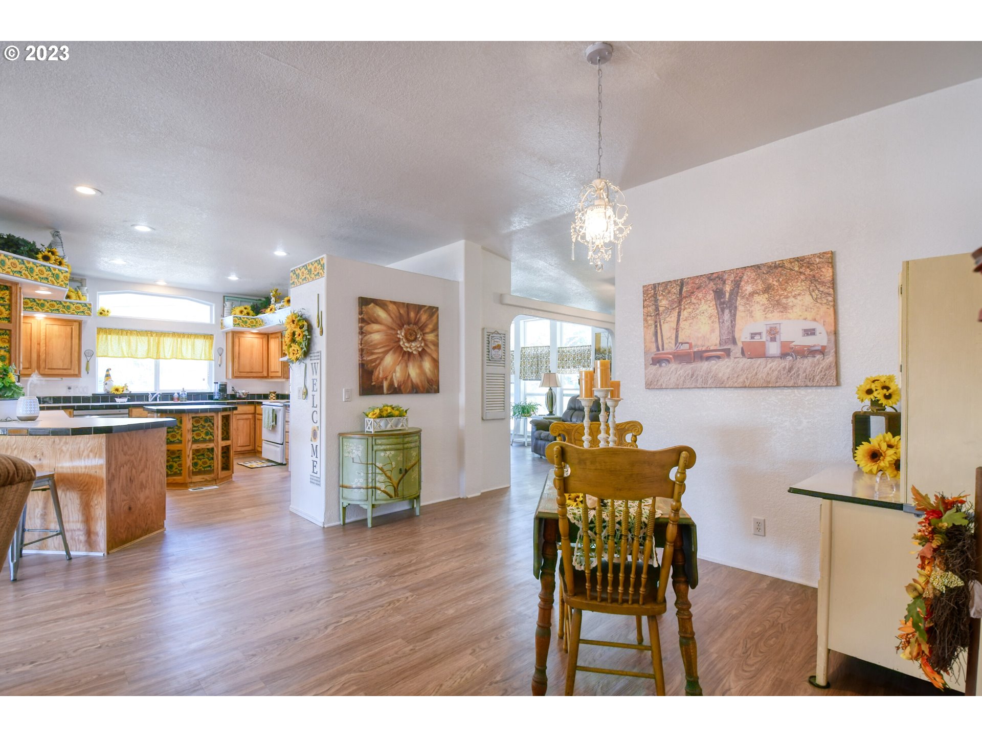 618 Northwest 6th Street Pendleton, OR 97801 - Photo 11 of 41 a dining room with furniture and wooden floor