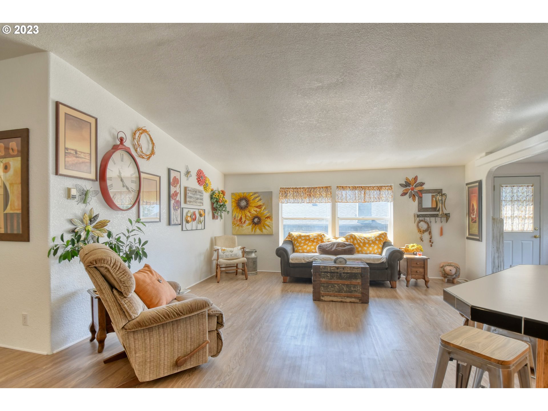 618 Northwest 6th Street Pendleton, OR 97801 - Photo 12 of 41 a living room with furniture and wooden floor
