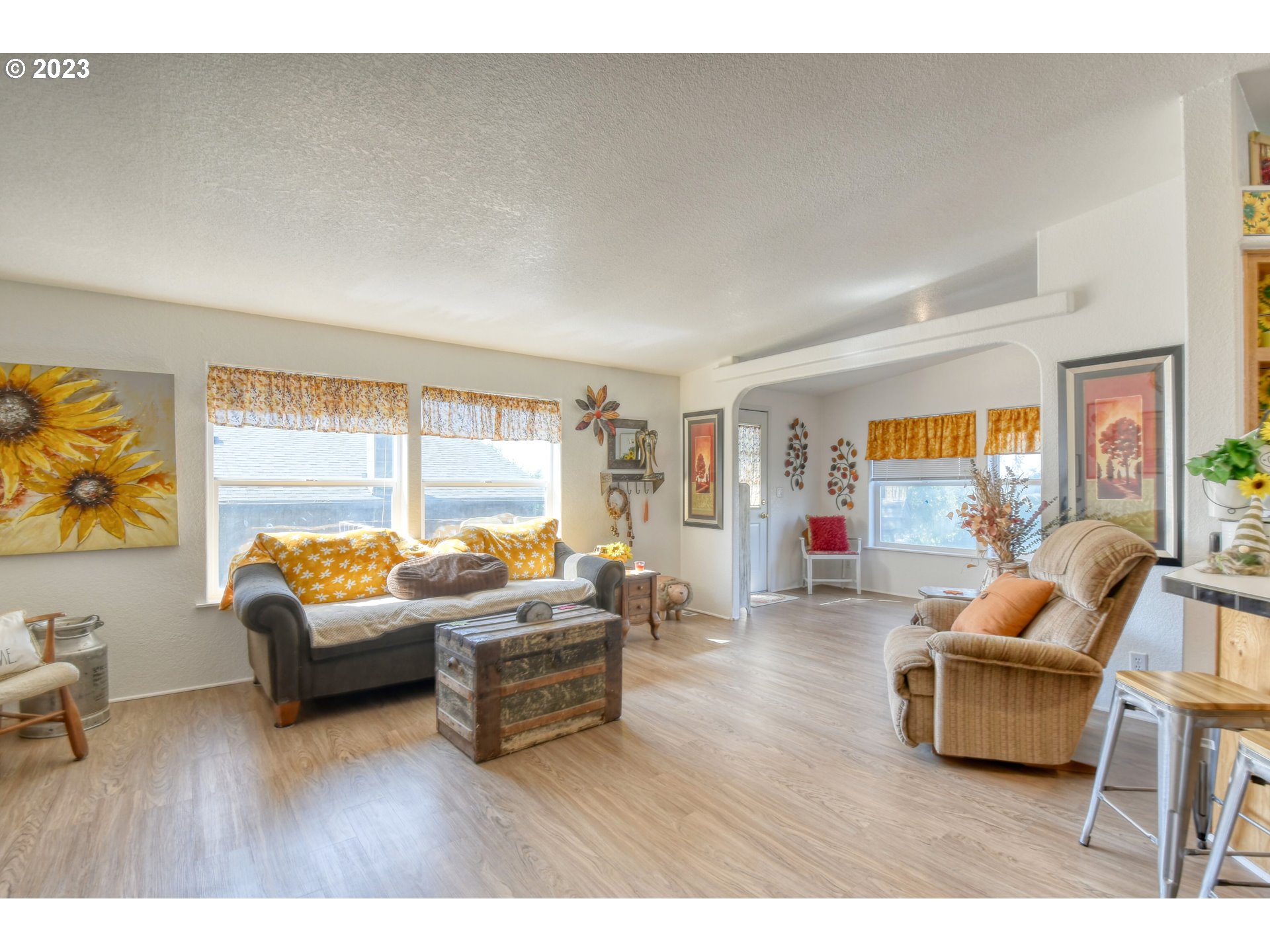 618 Northwest 6th Street Pendleton, OR 97801 - Photo 13 of 41 a living room with furniture and a large window