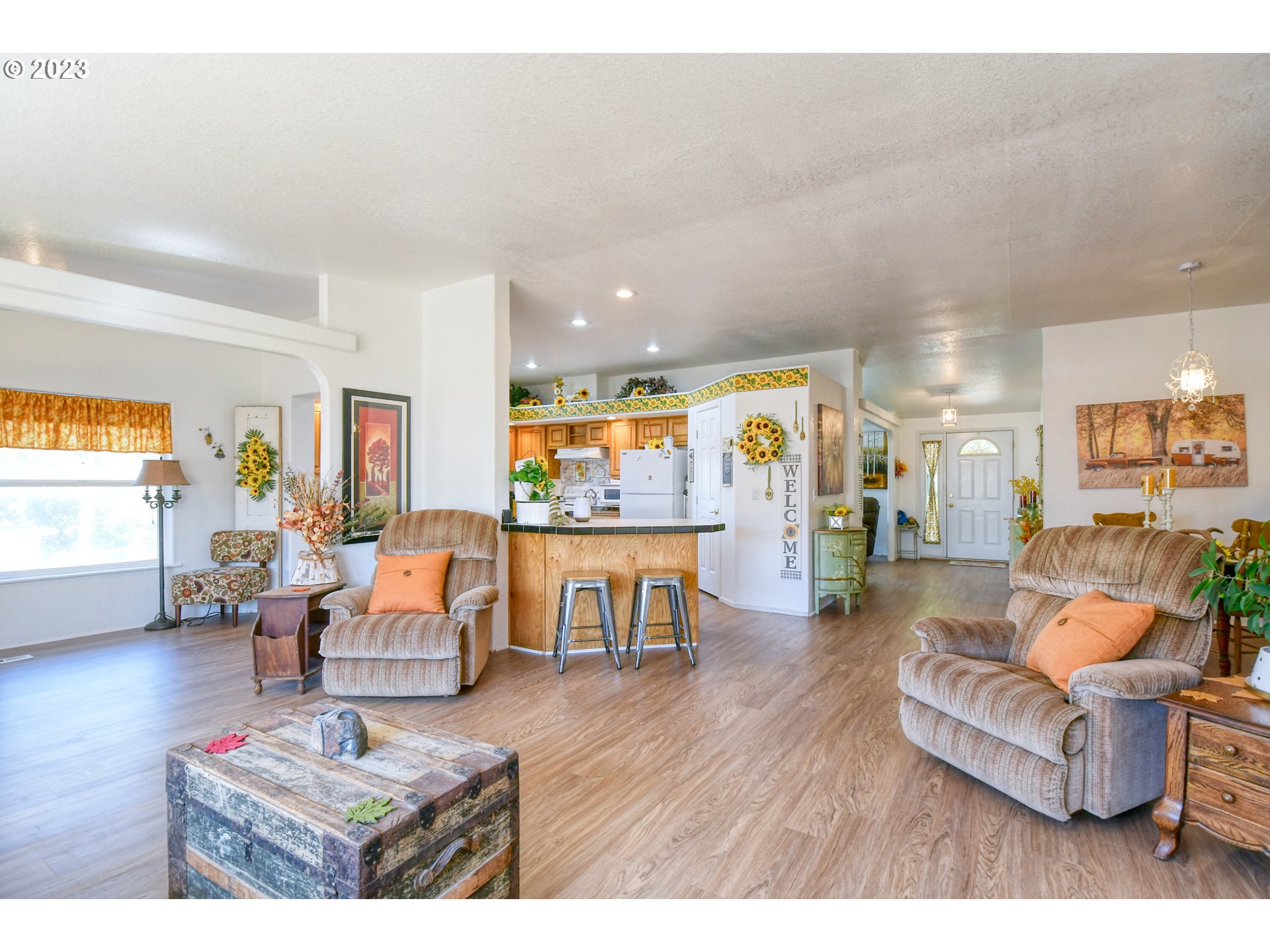 618 Northwest 6th Street Pendleton, OR 97801 - Photo 23 of 41 a living room with furniture and a wooden floor