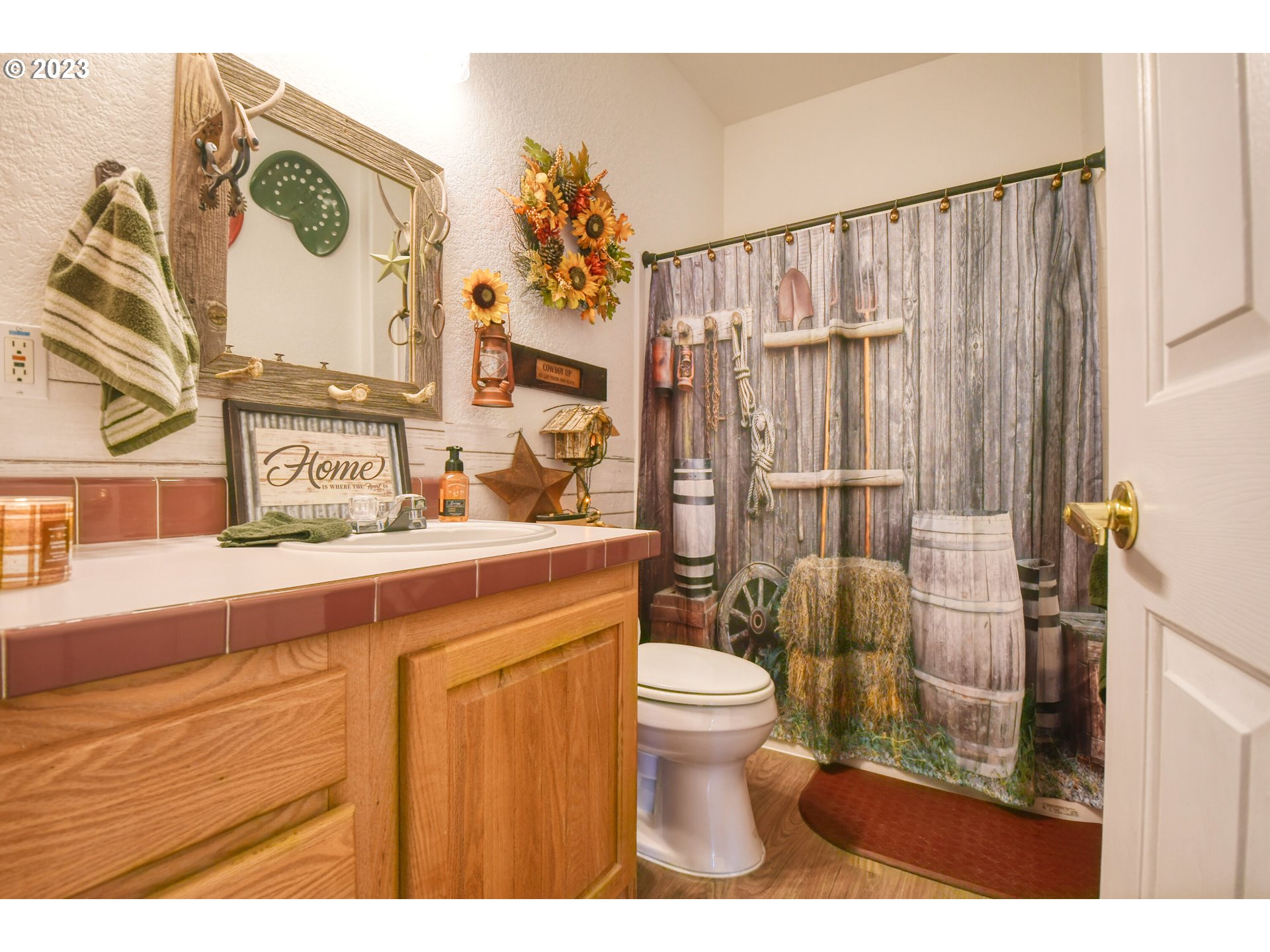 618 Northwest 6th Street Pendleton, OR 97801 - Photo 25 of 41 a bathroom with a sink a toilet and shower