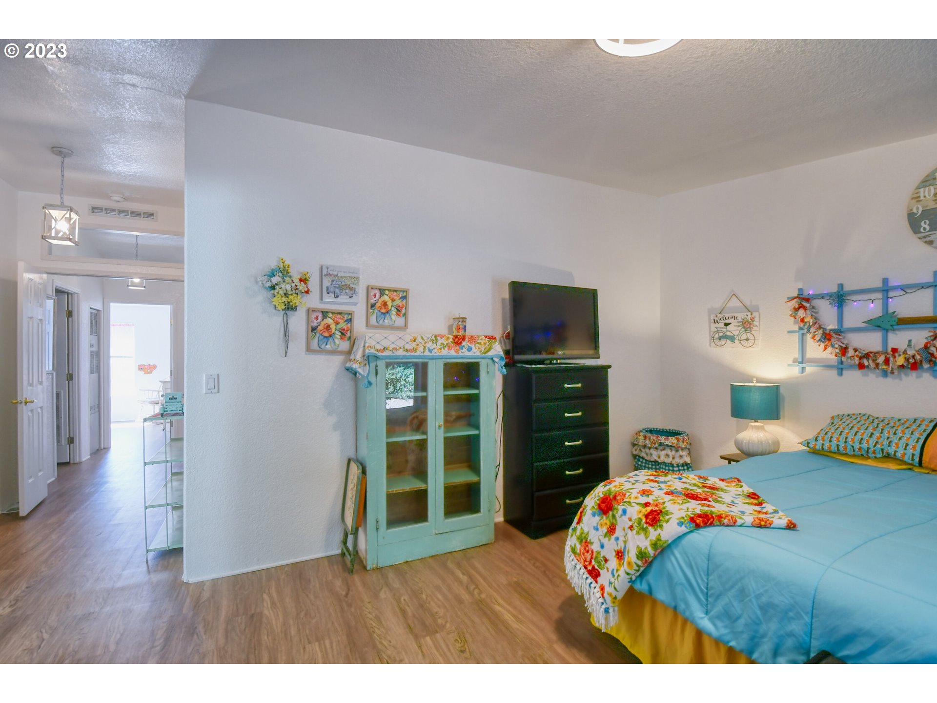618 Northwest 6th Street Pendleton, OR 97801 - Photo 26 of 41 a bedroom with a bed and a television