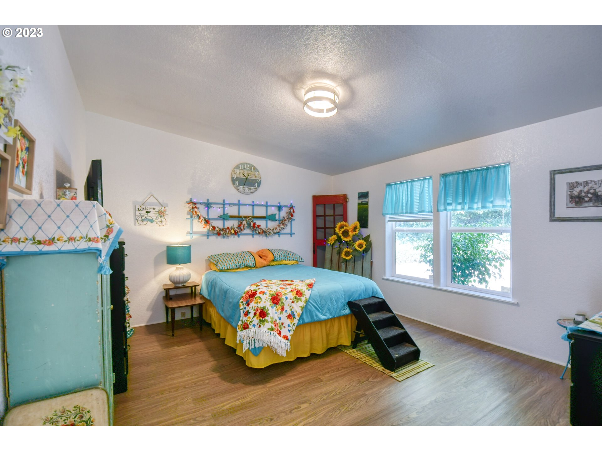 618 Northwest 6th Street Pendleton, OR 97801 - Photo 27 of 41 a bed room with a bed and a window