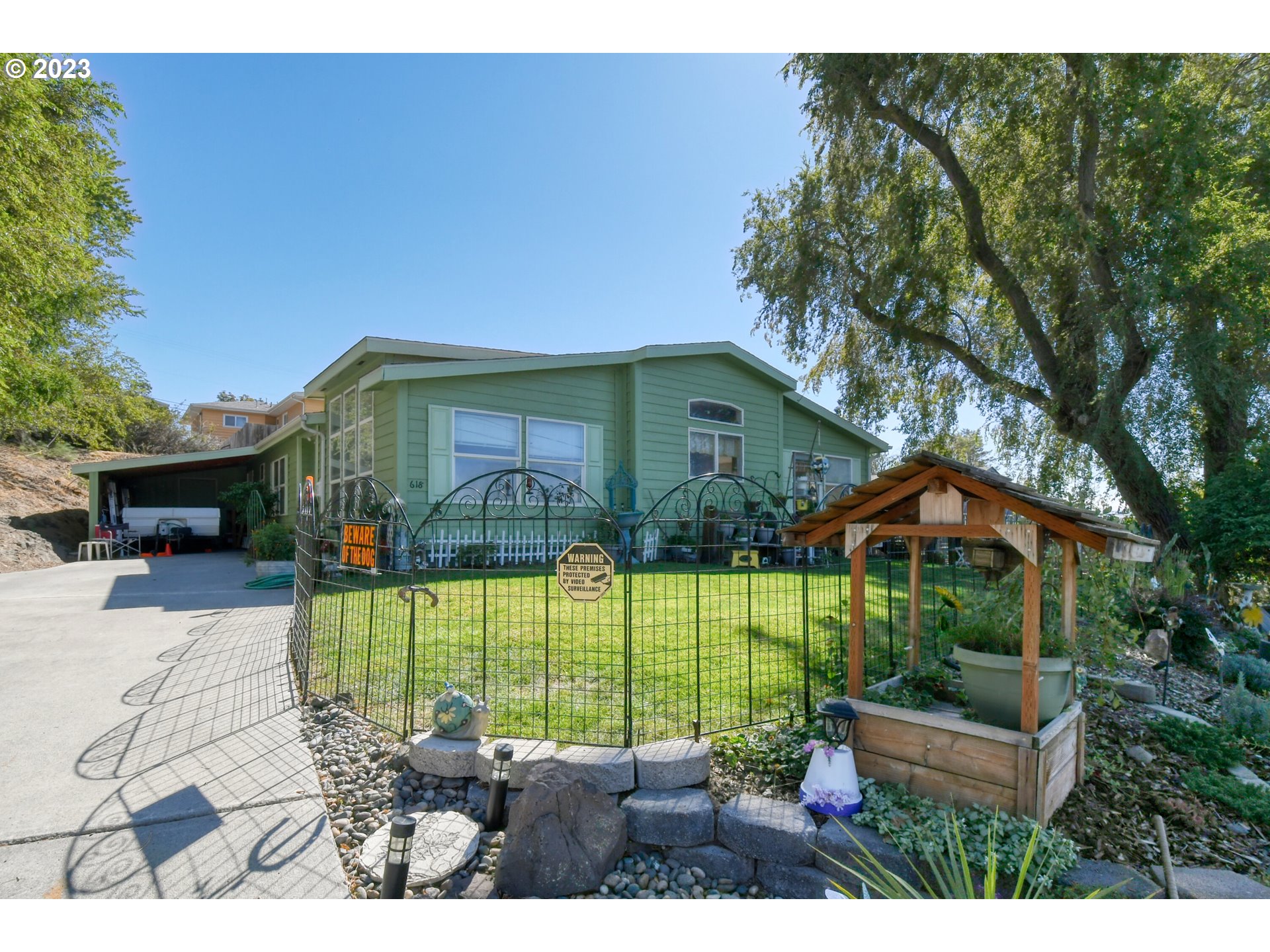 618 Northwest 6th Street Pendleton, OR 97801 - Photo 3 of 41 a front view of a house with garden