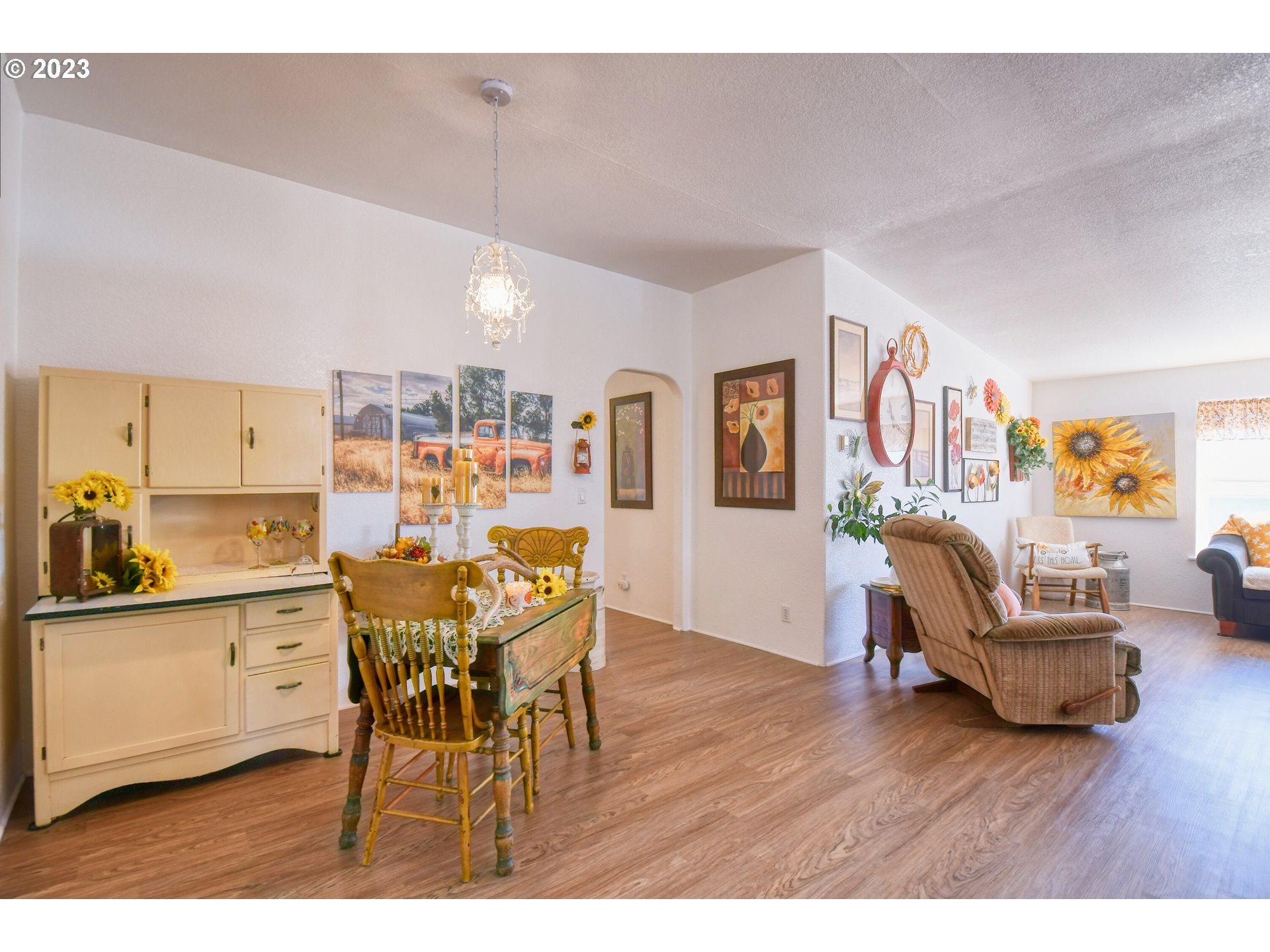 618 Northwest 6th Street Pendleton, OR 97801 - Photo 9 of 41 a view of a dining room with furniture and wooden floor