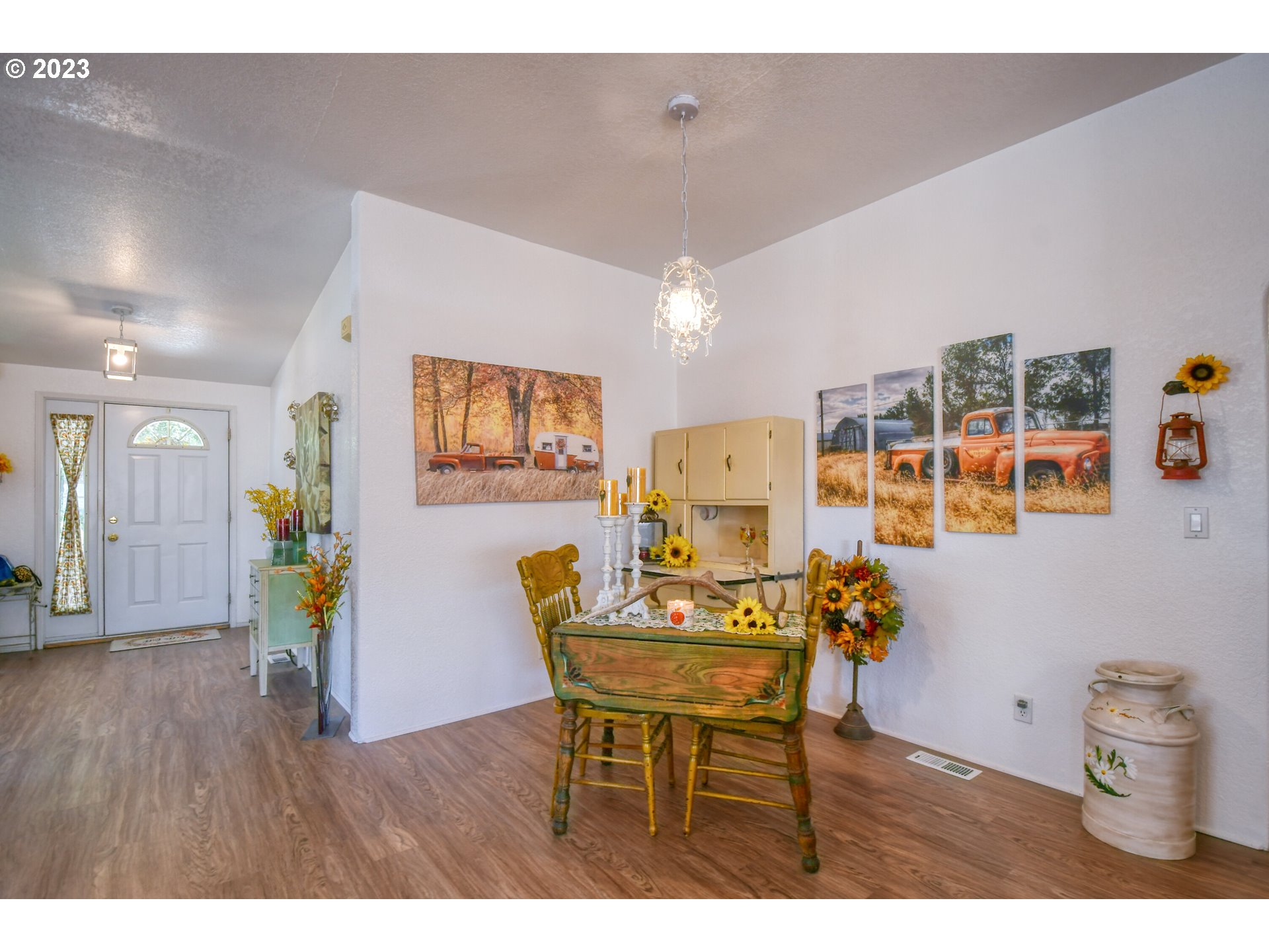 618 Northwest 6th Street Pendleton, OR 97801 - Photo 10 of 41 a dining room with furniture and wooden floor