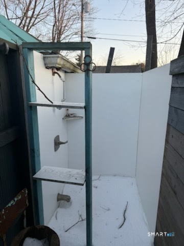 15 North Street Madison, CT 06443 - Photo 12 of 13 a bathroom with a shower