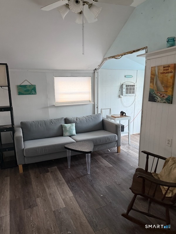 15 North Street Madison, CT 06443 - Photo 5 of 13 a living room with furniture and a wooden floor