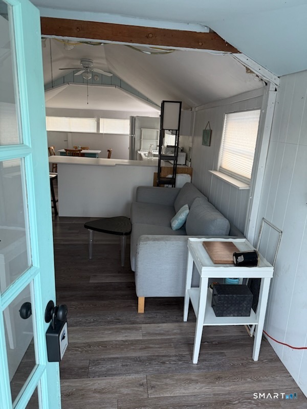 15 North Street Madison, CT 06443 - Photo 7 of 13 a living room with furniture and a window