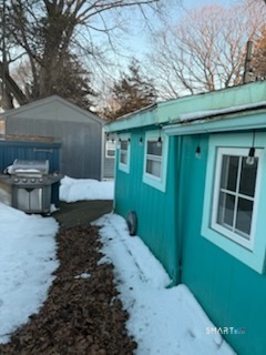15 North Street Madison, CT 06443 - Photo 9 of 13 a view of a backyard with large trees