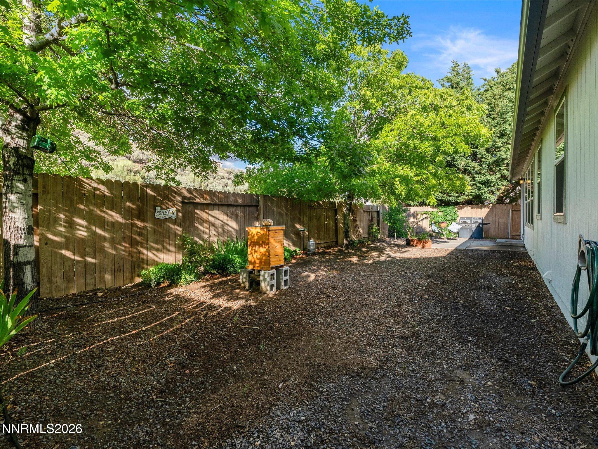 3101 Green River Drive Reno, NV 89503 - Photo 47 of 62 a view of a yard with a tree