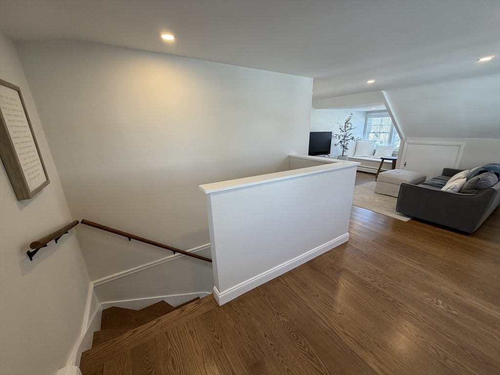 20 Smith Road, Unit SUMMER Rockport, MA 01966 - Photo 17 of 26 a view of a livingroom with furniture and staircase