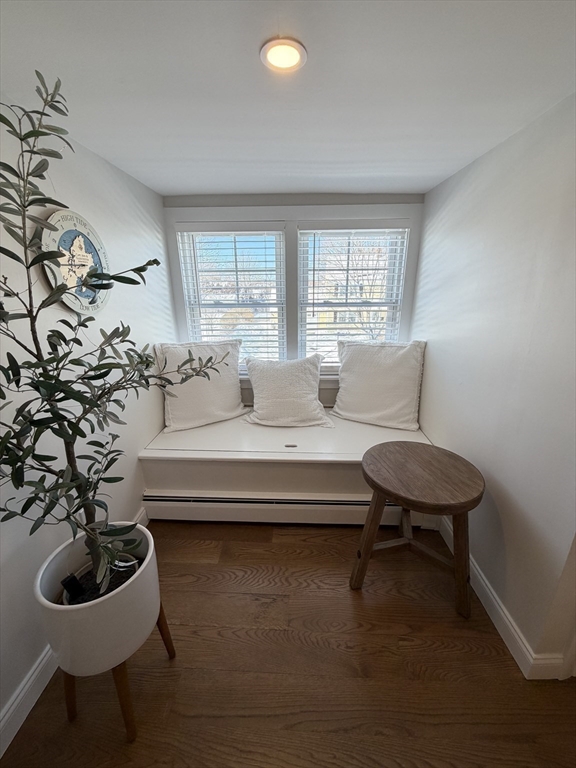 20 Smith Road, Unit SUMMER Rockport, MA 01966 - Photo 21 of 26 a living room with furniture and a potted plant