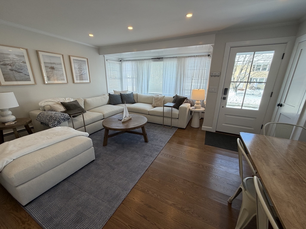 20 Smith Road, Unit SUMMER Rockport, MA 01966 - Photo 4 of 26 a living room with furniture and a window