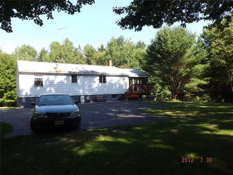 465 Curtis Road Swanville, ME 04915 - Photo 4 of 21 Exterior Back. The back yard is...