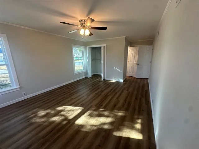 a view of an empty room and window