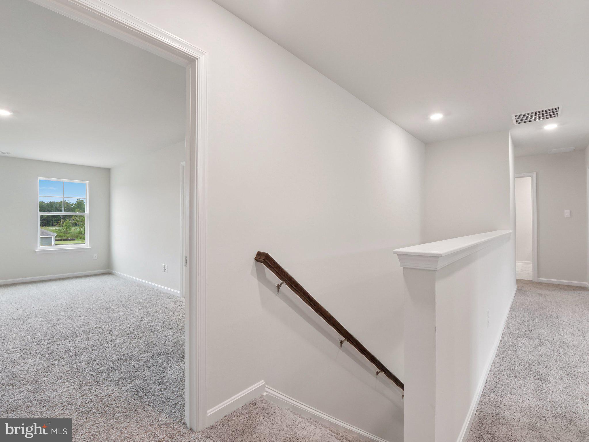 6262 Sterling Way Ruther Glen, VA 22546 - Photo 26 of 31 a view of hallway with stairs