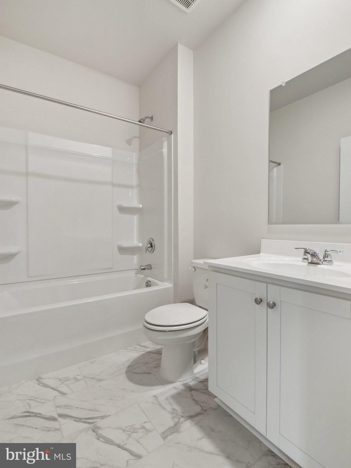 6262 Sterling Way Ruther Glen, VA 22546 - Photo 27 of 31 a bathroom with a sink toilet and shower