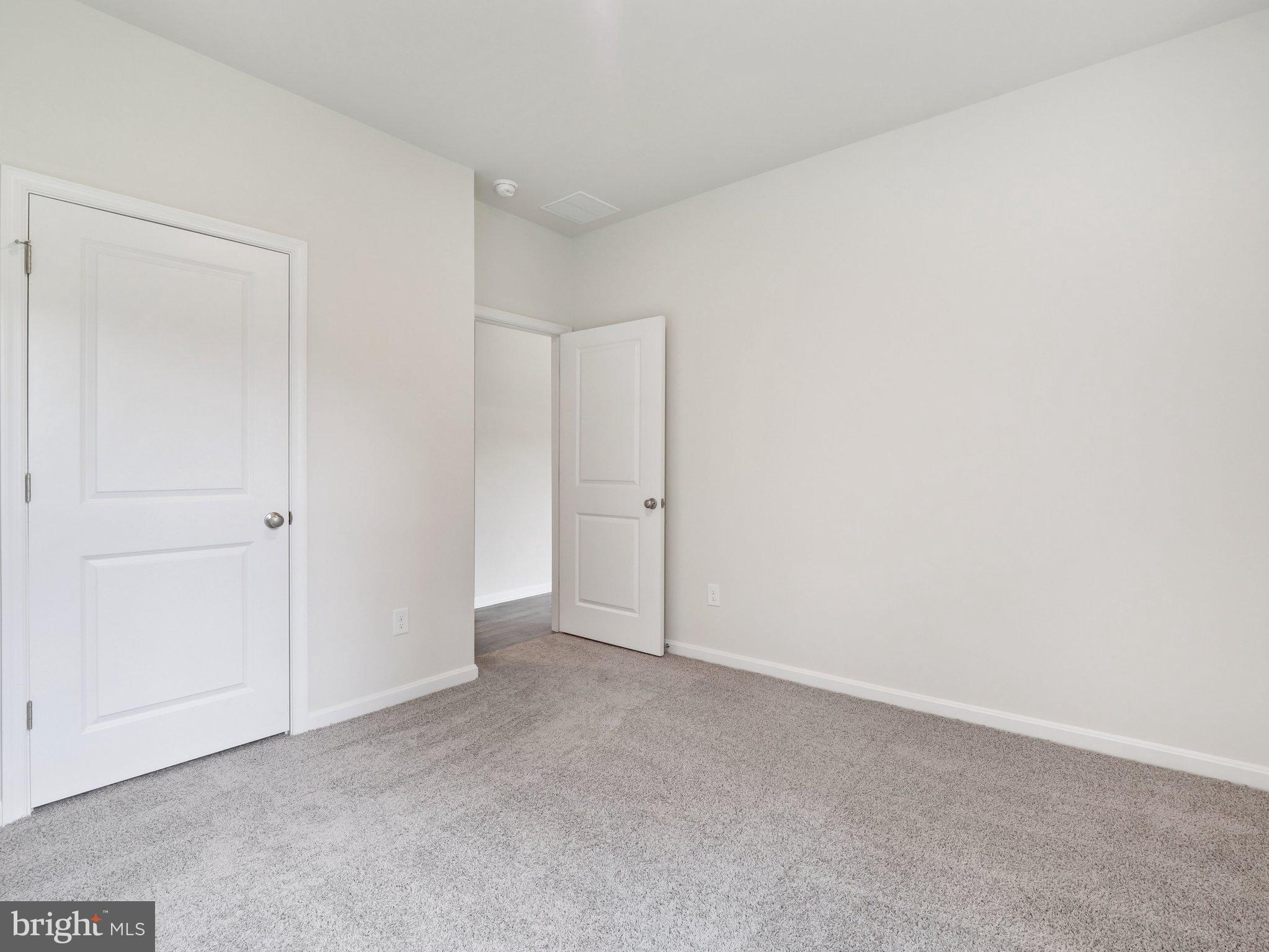6262 Sterling Way Ruther Glen, VA 22546 - Photo 28 of 31 a view of an empty room