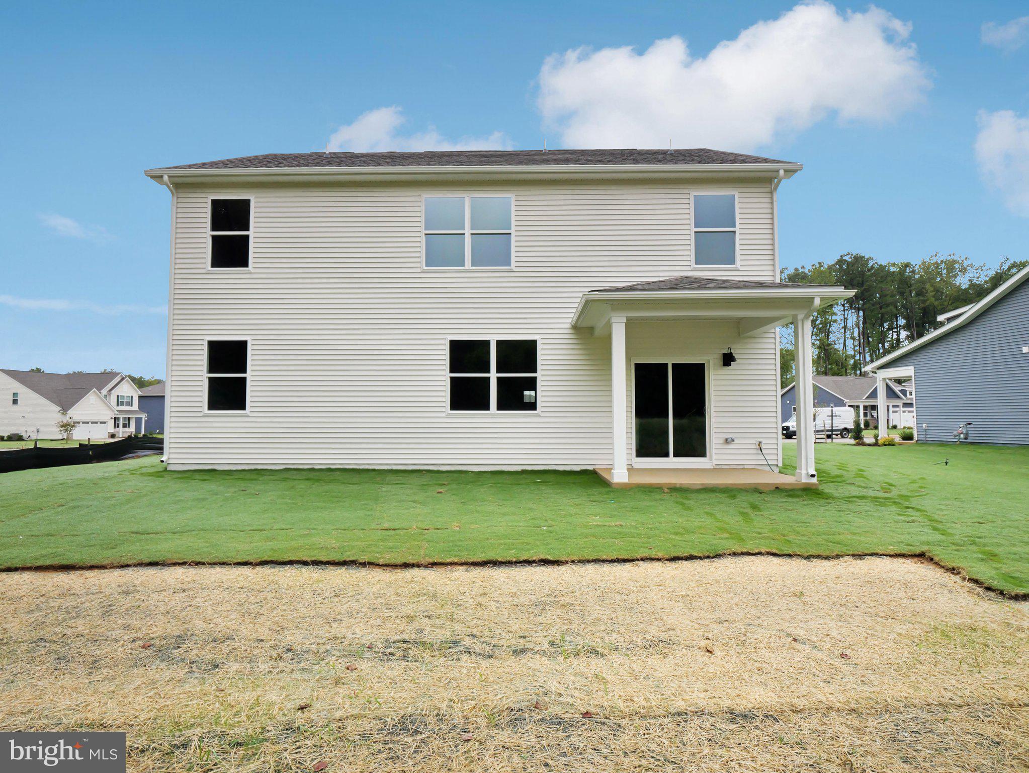 6262 Sterling Way Ruther Glen, VA 22546 - Photo 31 of 31 a front view of a house with a yard