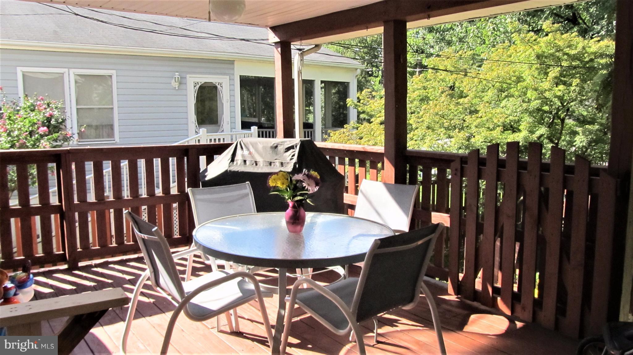 524 Cleveland Road Linthicum Heights, MD 21090 - Photo 17 of 27 Covered deck for outdoor entertaining!