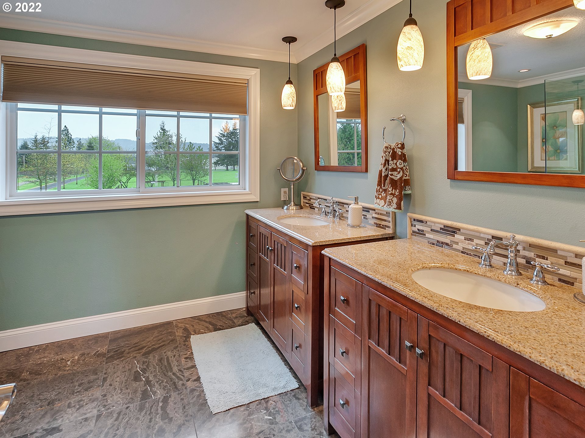 8505 Northeast Dog Ridge Road Newberg, OR 97132 - Photo 10 of 32 a bathroom with a sink and a mirror