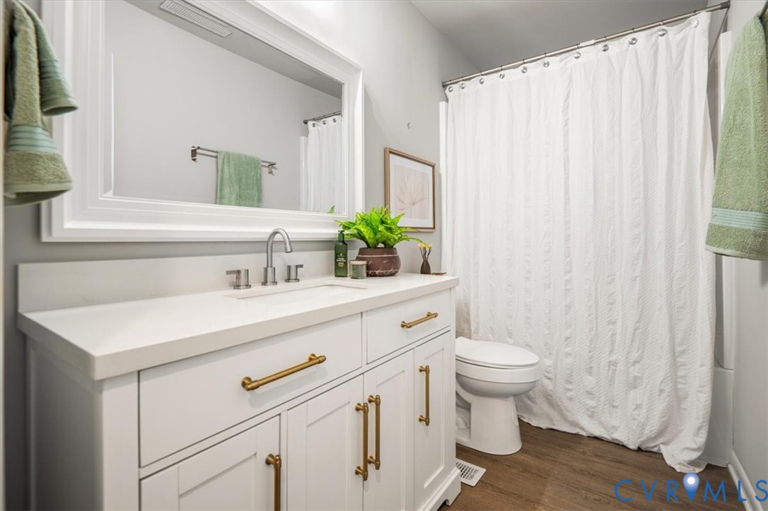 4400 Treely Road Chester, VA 23831 - Photo 31 of 47 Modern vanity featuring a white countertop, underm