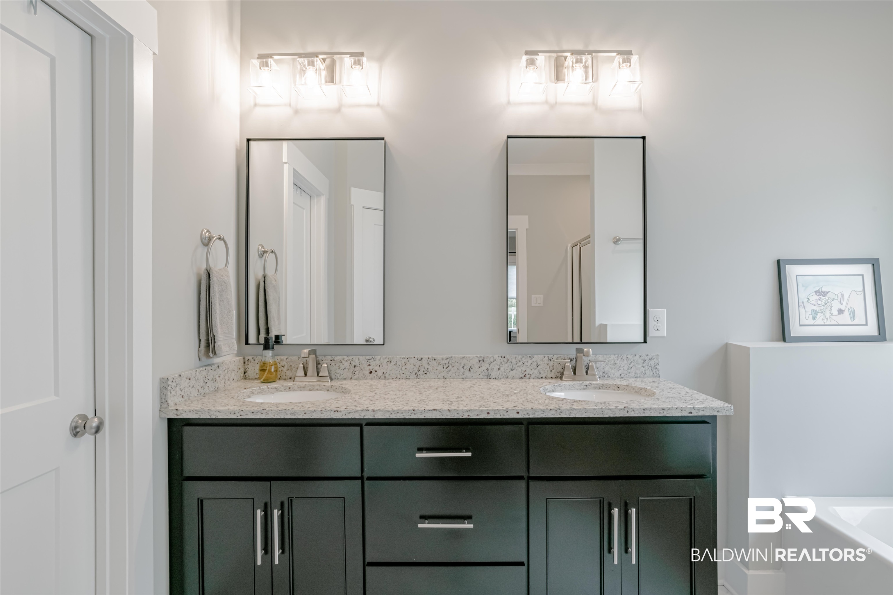 655 H Norman Lane Fairhope, AL 36532 - Photo 19 of 30 Bathroom featuring vanity and a bathtub