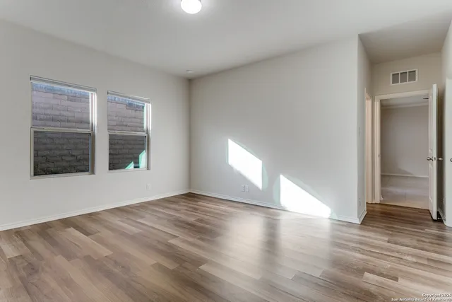 a bathroom with a double vanity sink a and mirror