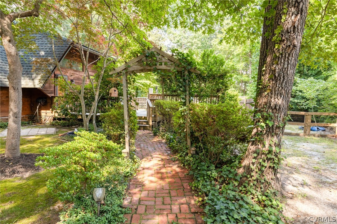 13473 Miller Road Chester, VA 23831 - Photo 39 of 50 a backyard of a house with lots of green space