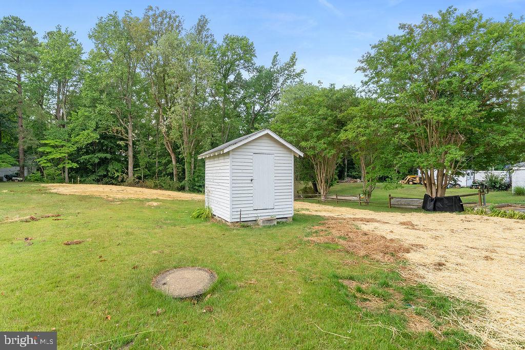 10221 Dahlgren Road King George, VA 22485 - Photo 27 of 31 a view of a backyard of the house