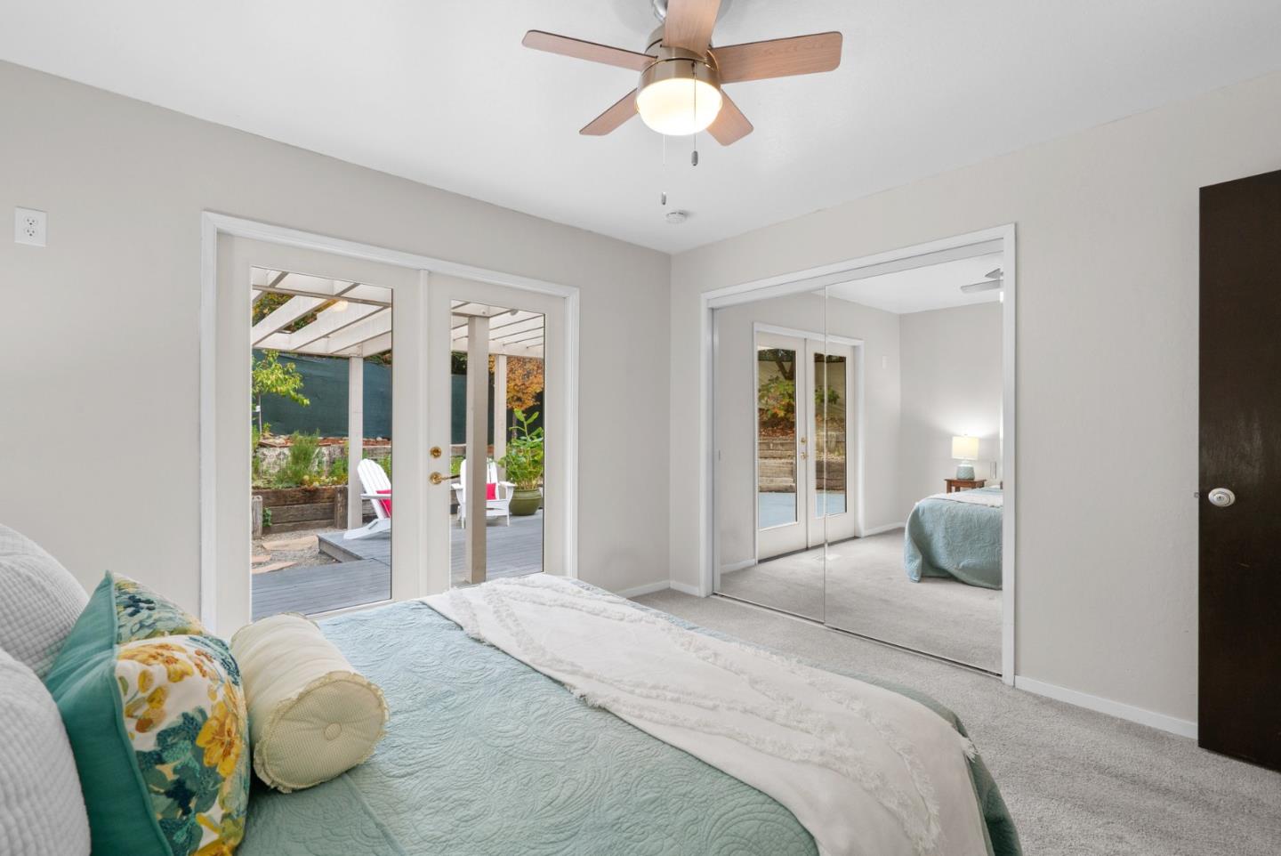 314 Hames Road Watsonville, CA 95076 - Photo 20 of 32 a bedroom with a bed and ceiling fan