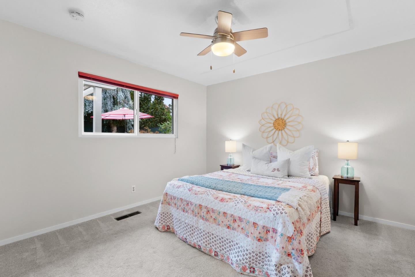 314 Hames Road Watsonville, CA 95076 - Photo 22 of 32 a bedroom with a bed and a chandelier